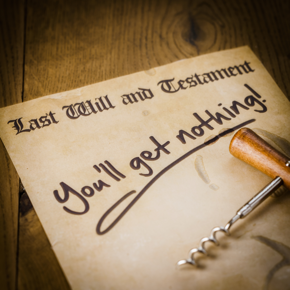 Humorous will of a spendthrift with a corkscrew and scrawled message You'll get nothing