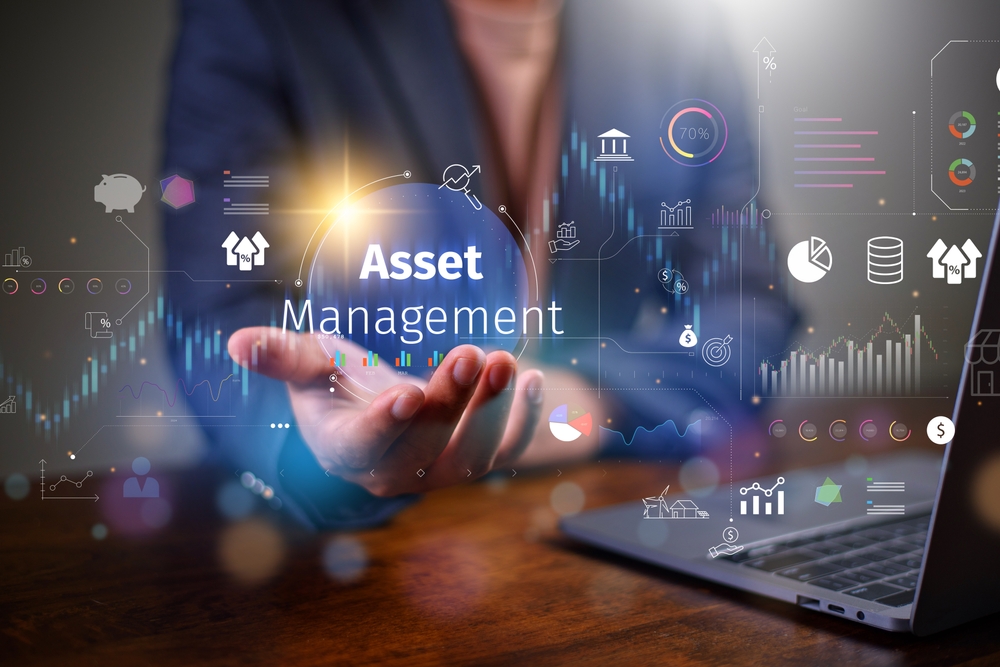 Asset management concept, Businessman Holding asset management and Icon on virtual display. Financial Property Digital assets